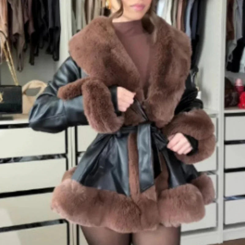 Women's coat made of faux leather with faux fur collar