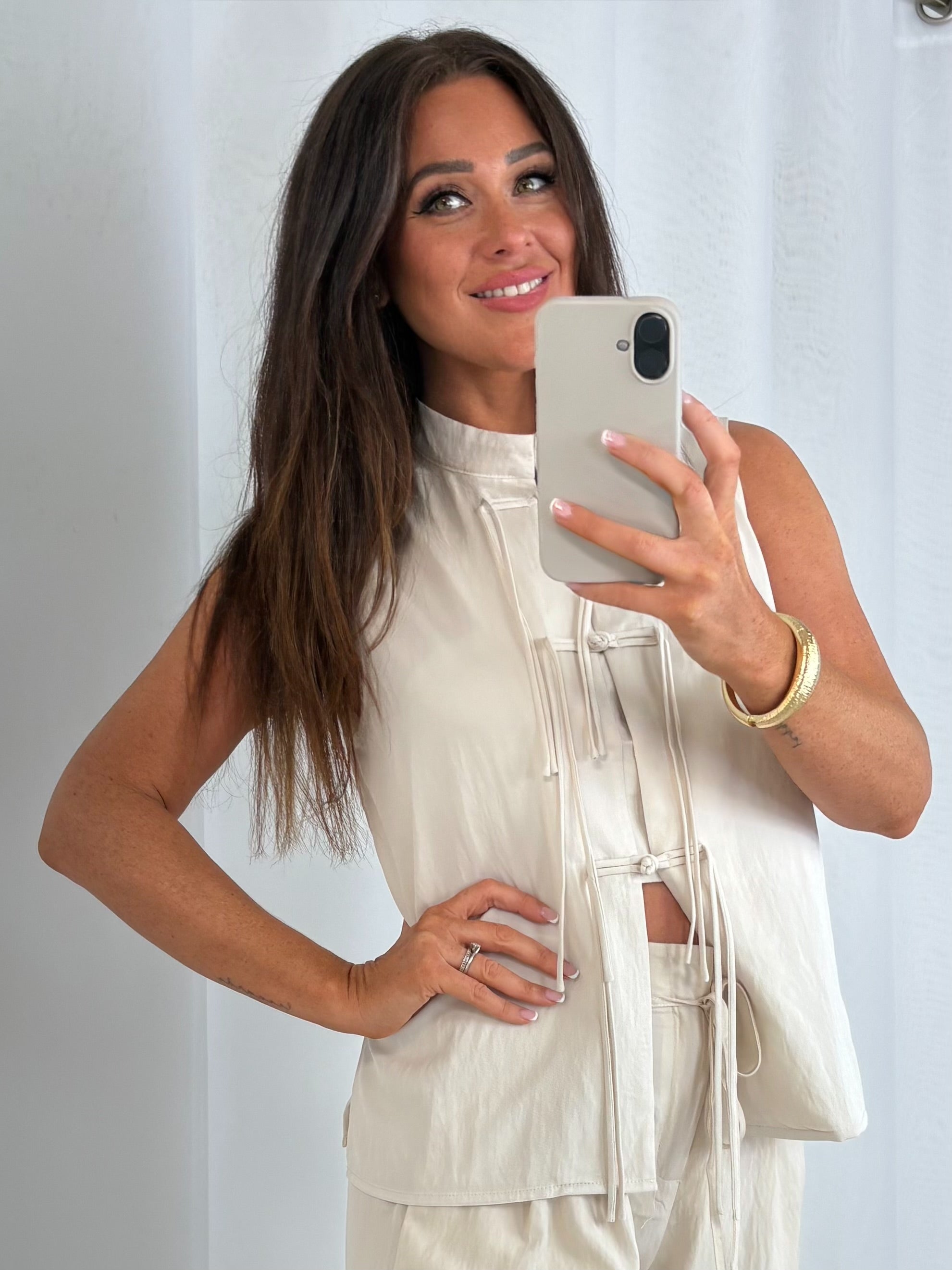 Cream Sleeveless Tie-Front Top With Wide-Leg Trousers