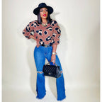 DISTRESSED FLARE JEANS